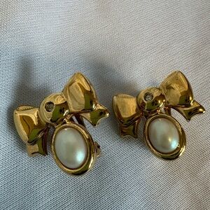A set of vintage gold-plated Nina Ricci clip-on earrings